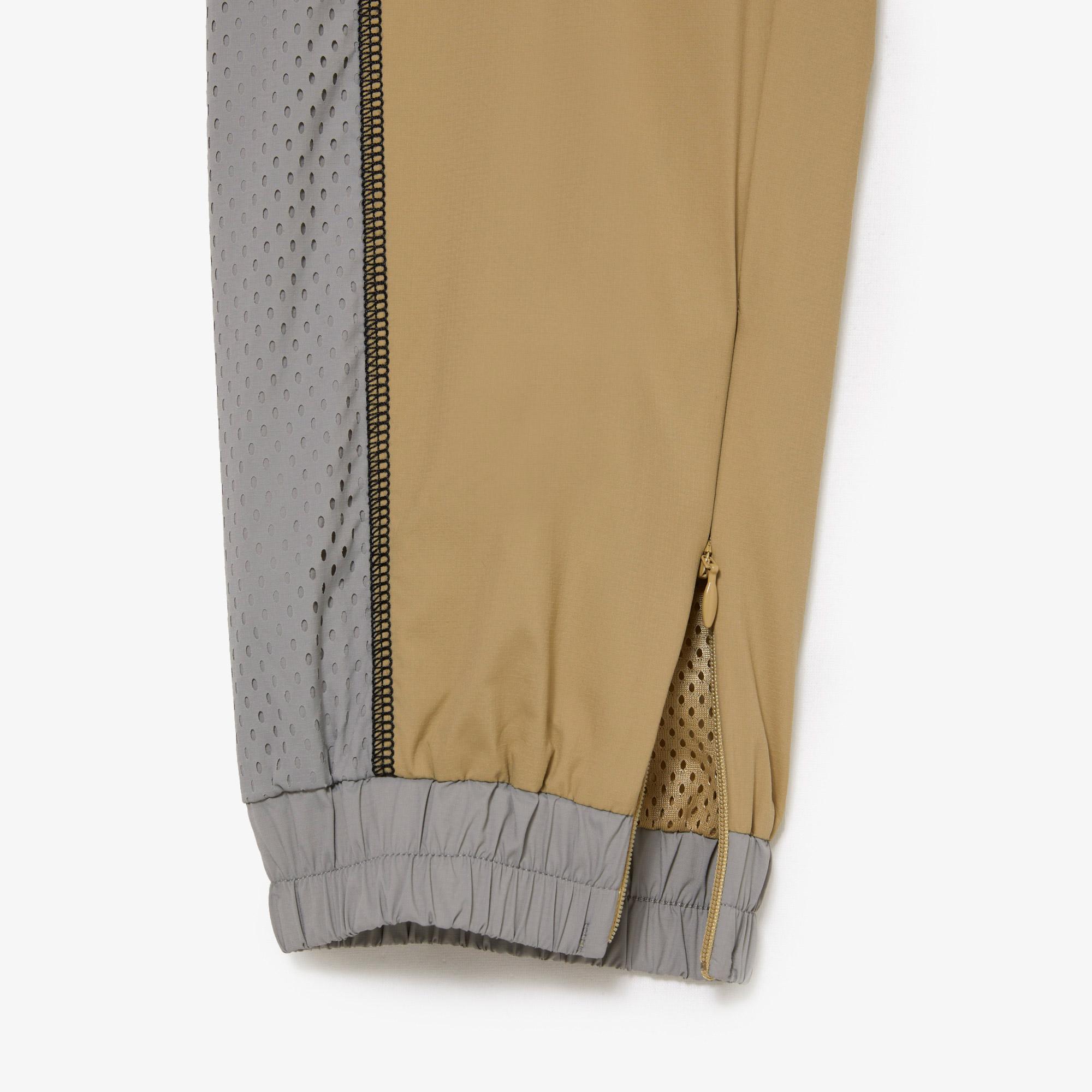 Dámske teplákové nohavice Lacoste s perforovaným efektom