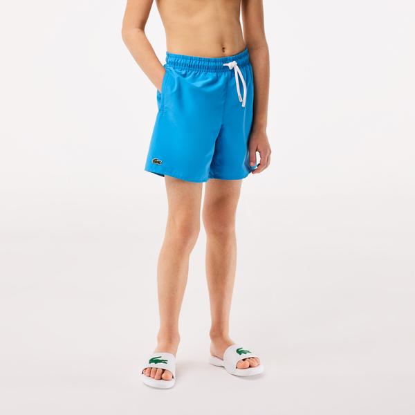 Chlapčenské rýchloschnúce pevné plavkové šortky Lacoste